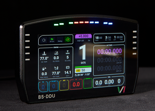 A black automotive diagnostic and performance display screen labeled B5-DDU, showing colorful digital readouts and status indicators against a dark studio background.